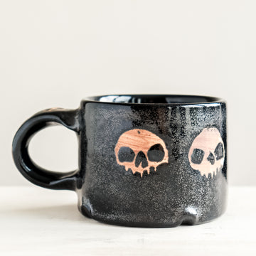 Black Five Skulls Mug
