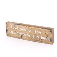 The Liquor Store and Back Sign