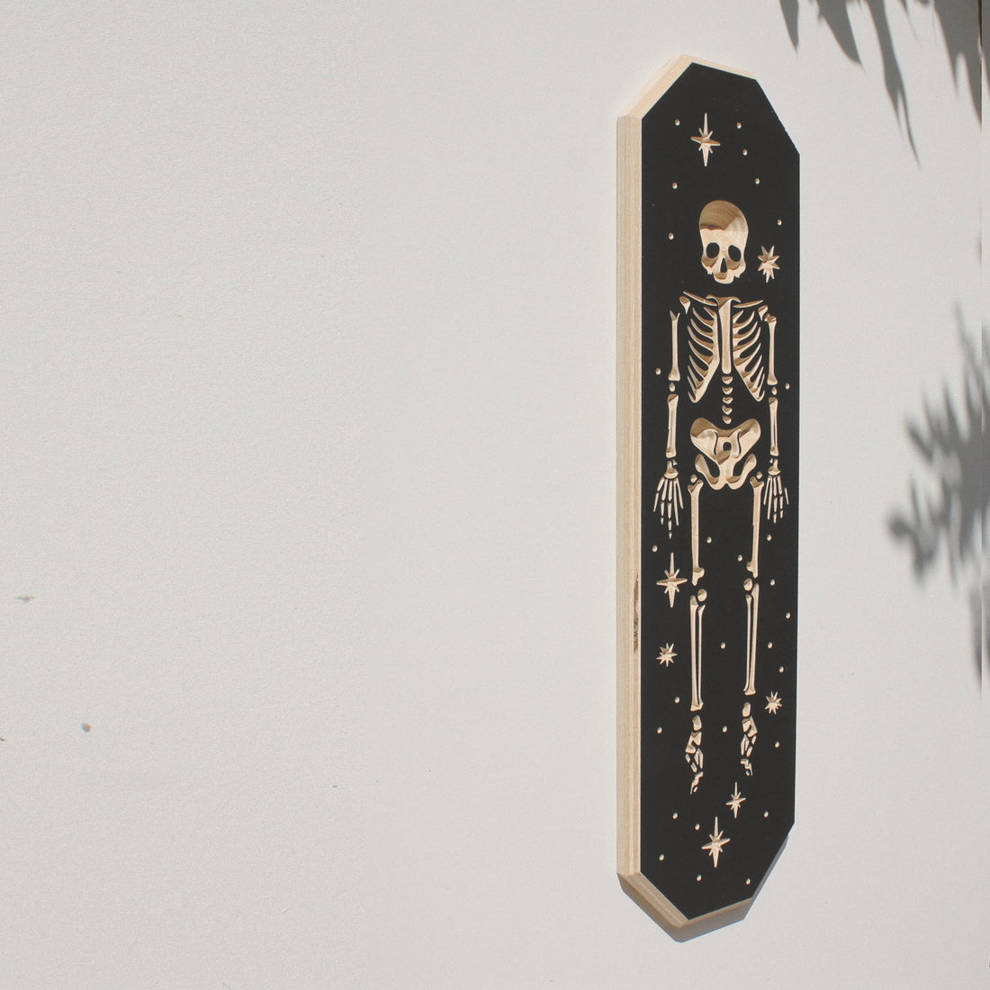 Carved Skeleton Wall Hanging