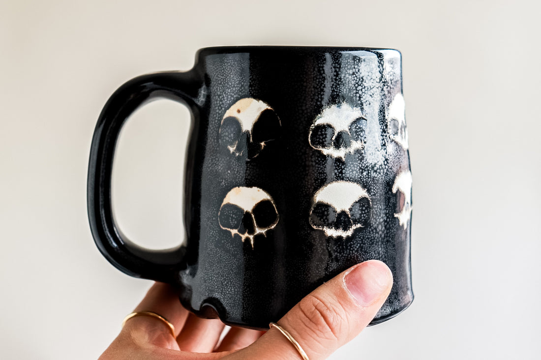 Twelve Skull Black Mug