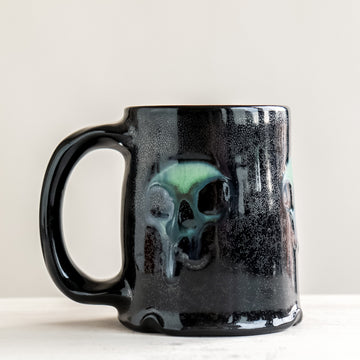 Triple Green Skull Black Mug