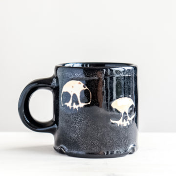 Quad Skull Black Mug