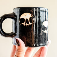 Quad Skull Black Mug