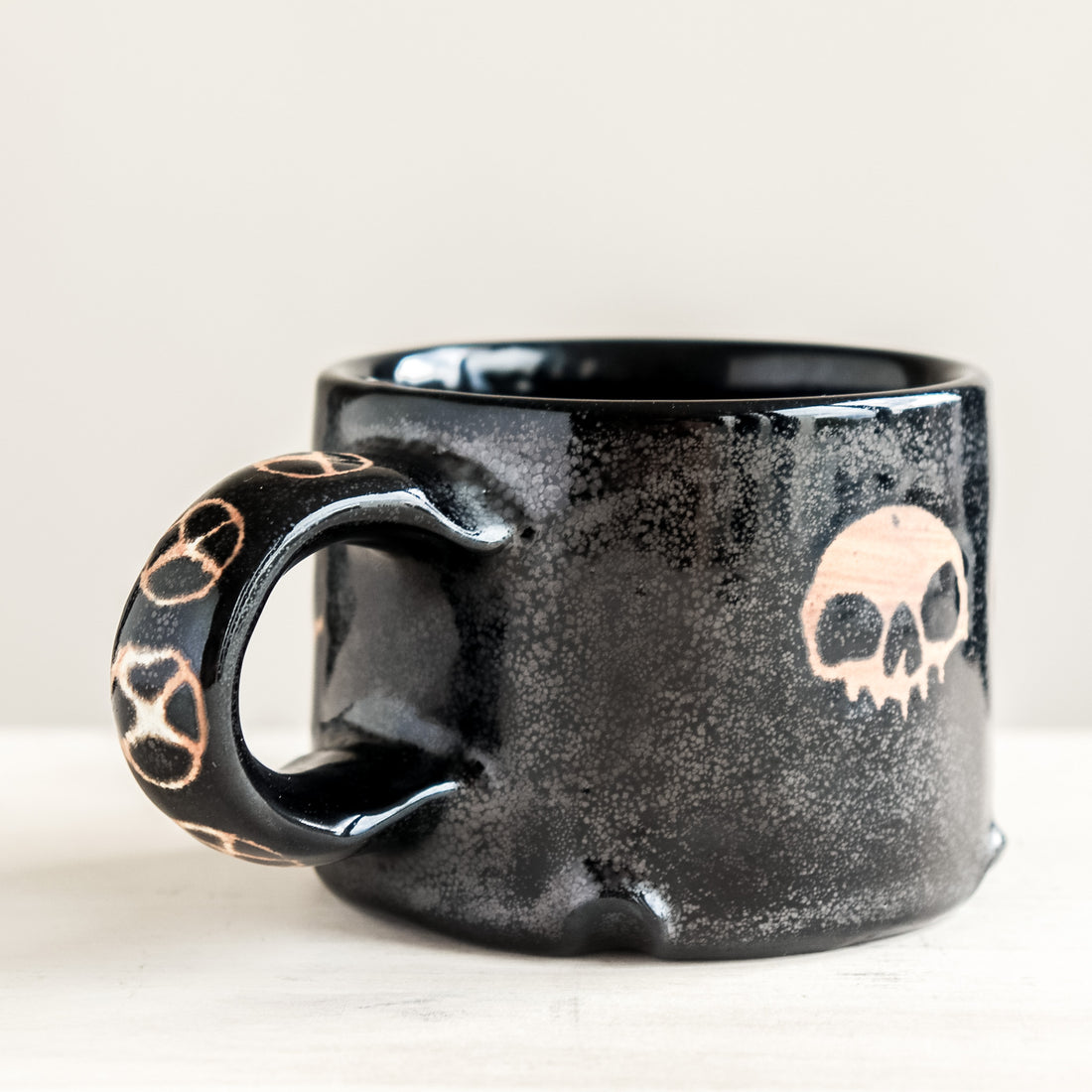 Black Five Skulls Mug