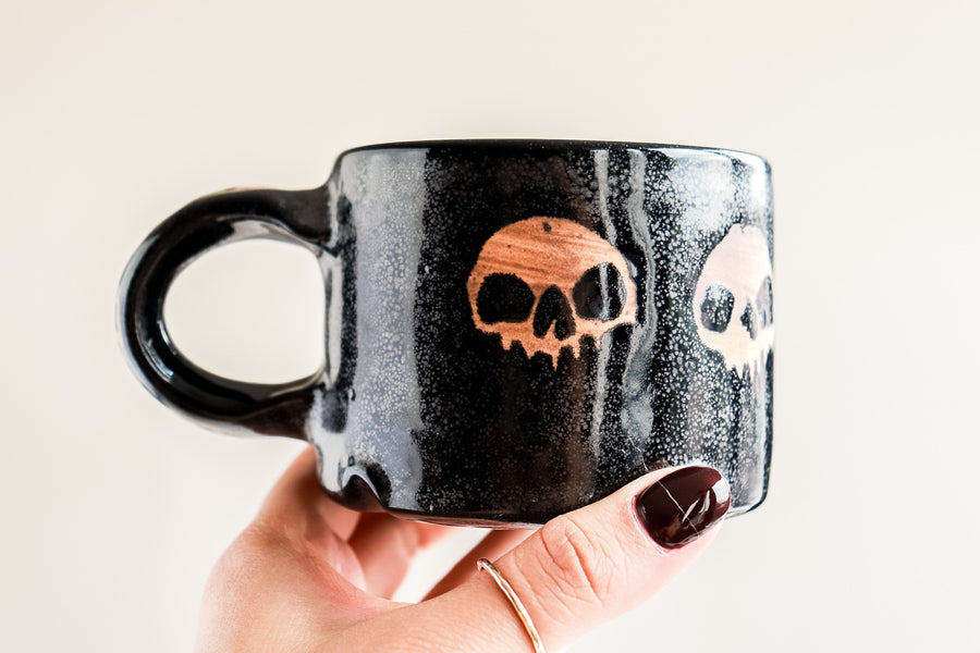 Black Five Skulls Mug