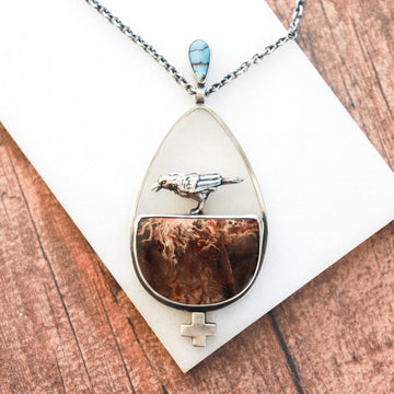 Petrified Wood Turquoise Raven Necklace