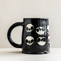 Ten Skulls Black Mug