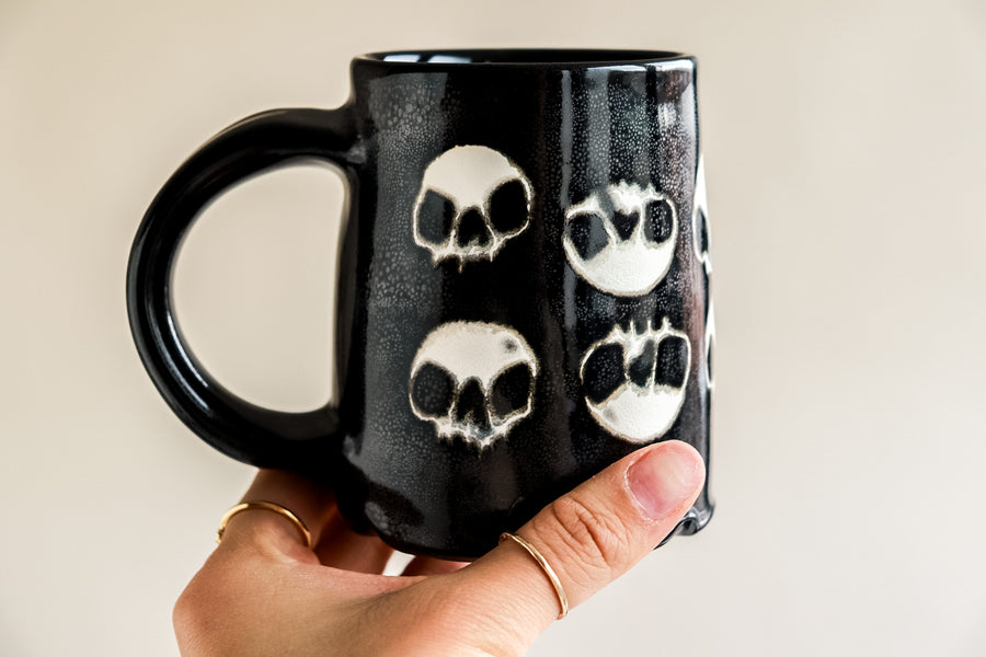 Ten Skulls Black Mug