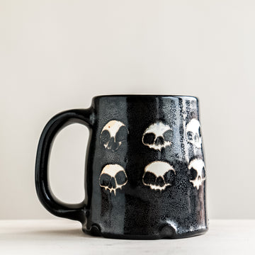 Twelve Skull Black Mug